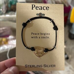 51. Sterling Silver Stamped Peace Bracelet